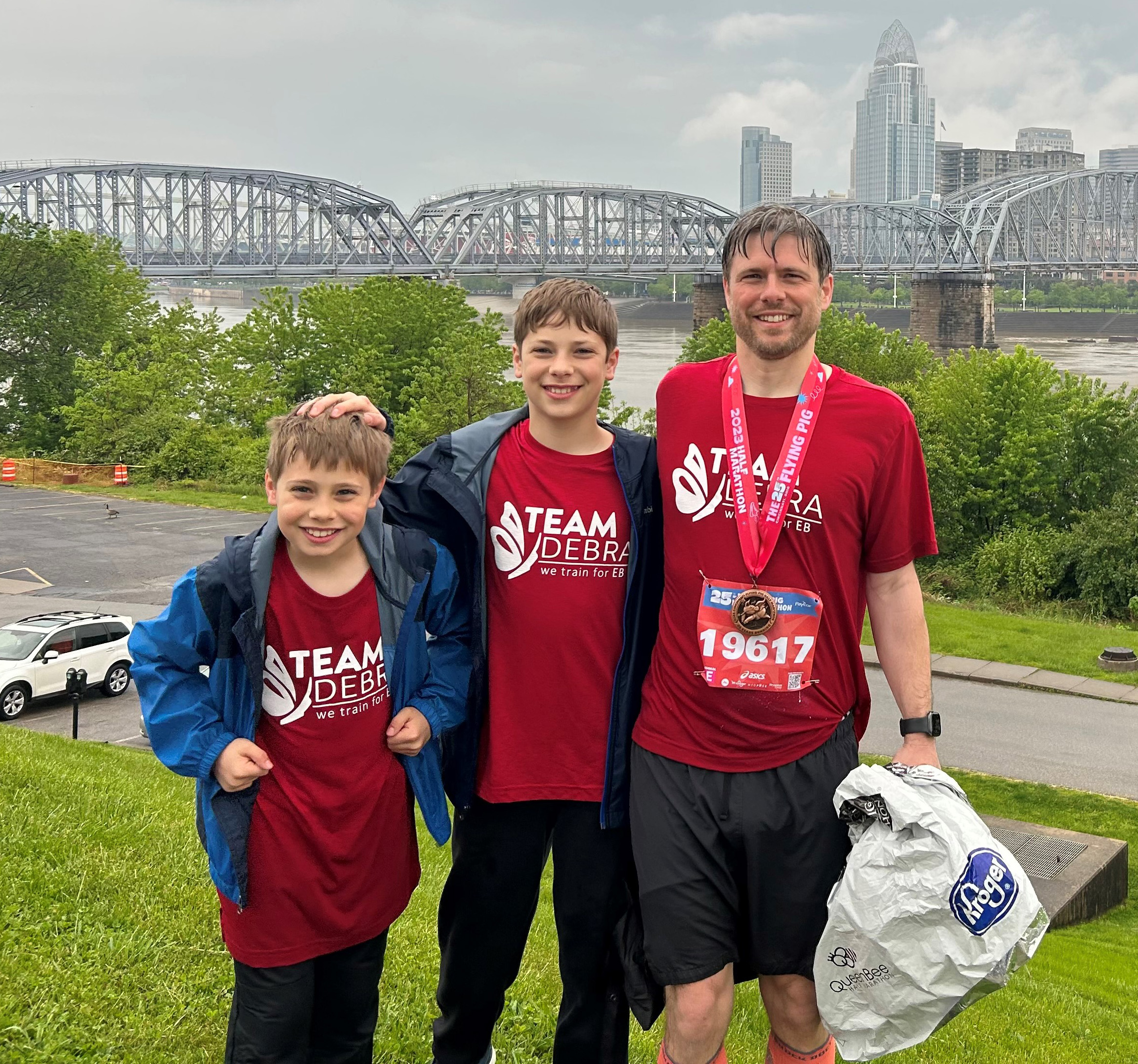 Scott and his sons at the 2023 Flying Pig Marathon Weekend
